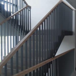 Staircase railing with wood