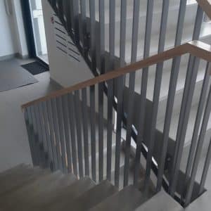 Staircase railing with wood