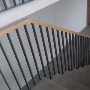 Staircase railing with wood