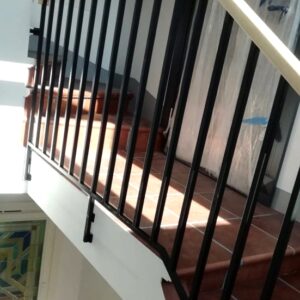 Internal staircase balustrade with wood