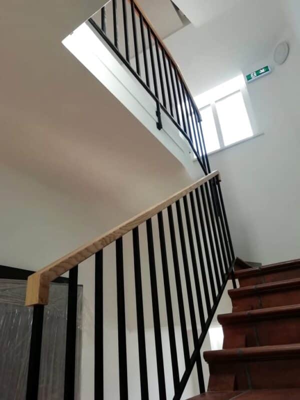 Internal staircase balustrade with wood