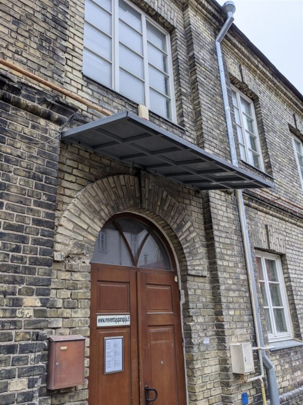 Metal roof over door